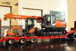 HITACHI ZX210LC TELESCOPIC CRAWLER CRANE AND HITACHI ZX17 BEING DELIVERED TO THE UK
